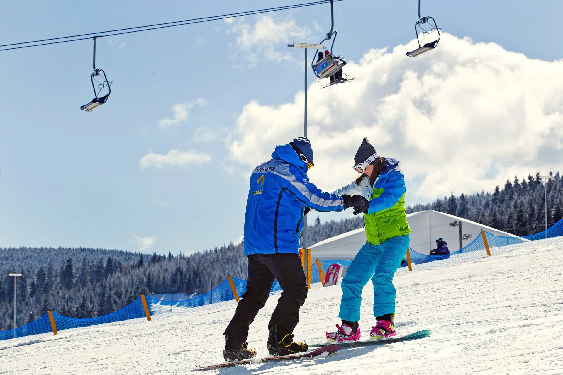 Lekcja snowboardu na stoku Bartuś
